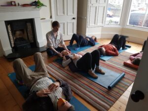 People engaged in Alexander lying down during Edinburgh Alexander Training School open day