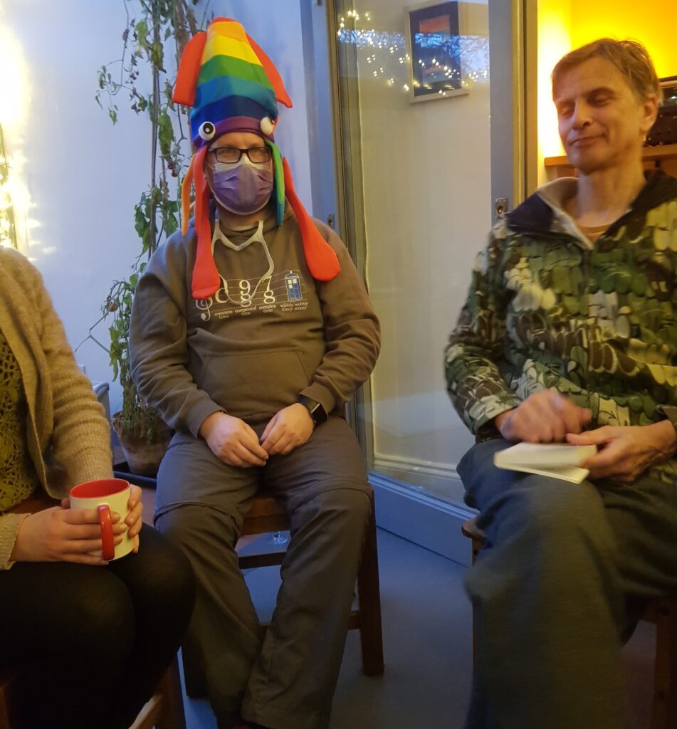One of our trainees wearing the rainbow squid hat at the Christmas party