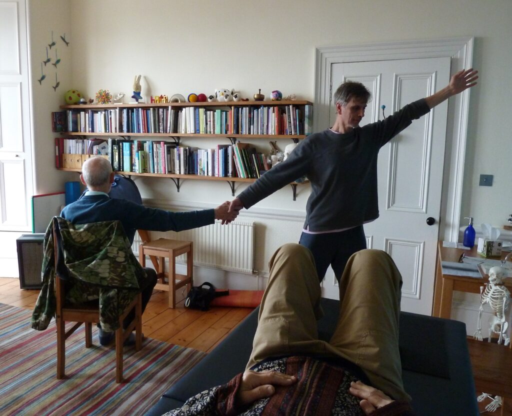 Photo of people working with the Alexander Technique