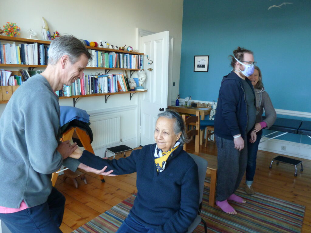 Photo of a group of trainees and teachers at Edinburgh Alexander Training School engaged in exploring movement